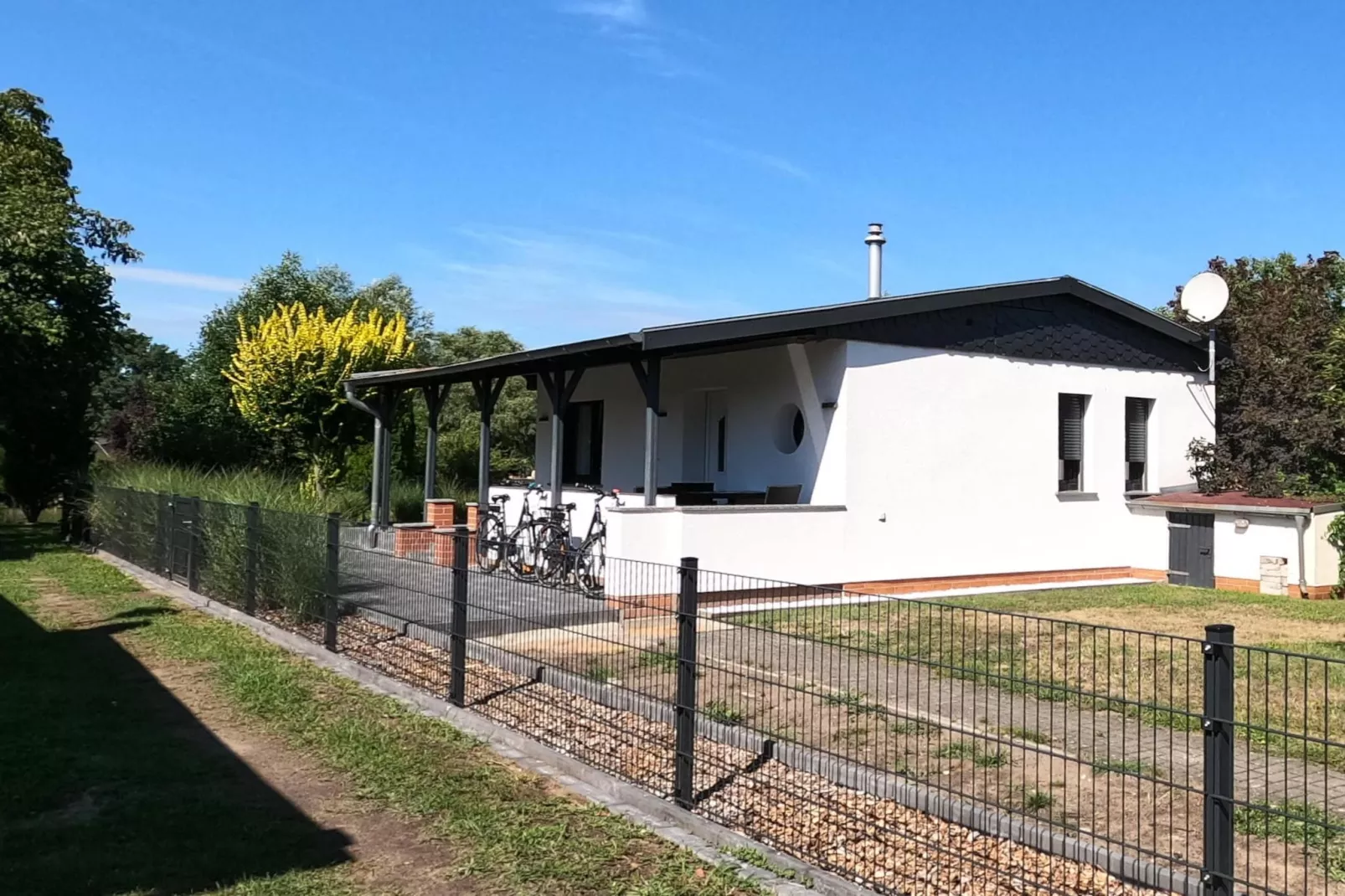 Ferienhaus mit Wasserblick 2 Pers-Buitenkant zomer