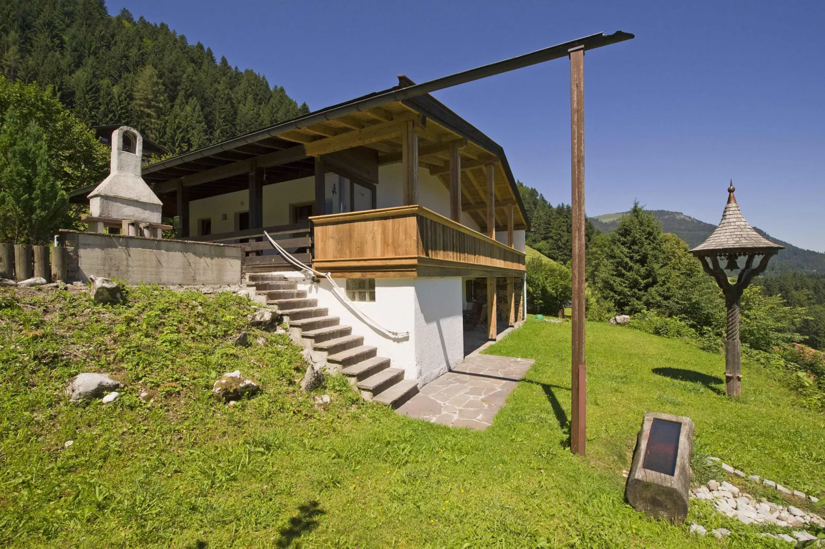 Chalet Niederndorferberg 1-Buitenkant zomer