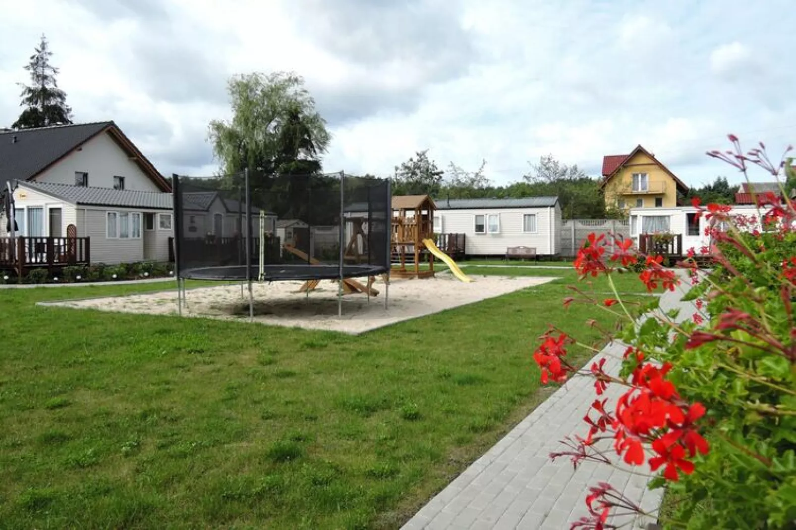 Holiday homes by the Lake Kolczewo 1-6 pers-Tuinen zomer