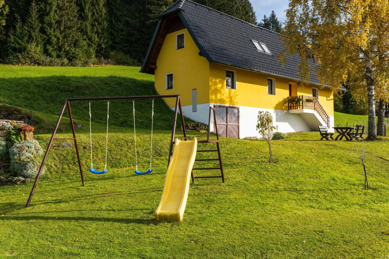 Traunig Hütte-Tuinen zomer