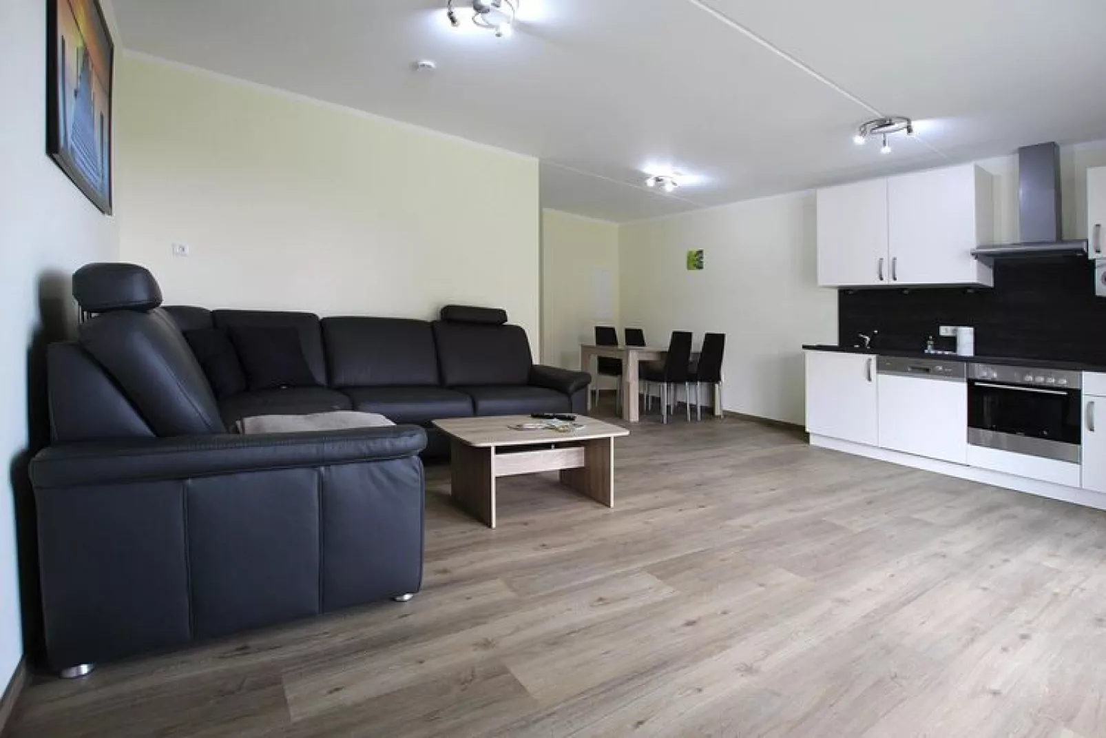 Apartment Hafenflair / Haus 3 EG-Wohnung 9 2 und 2 Personen-Woonkamer