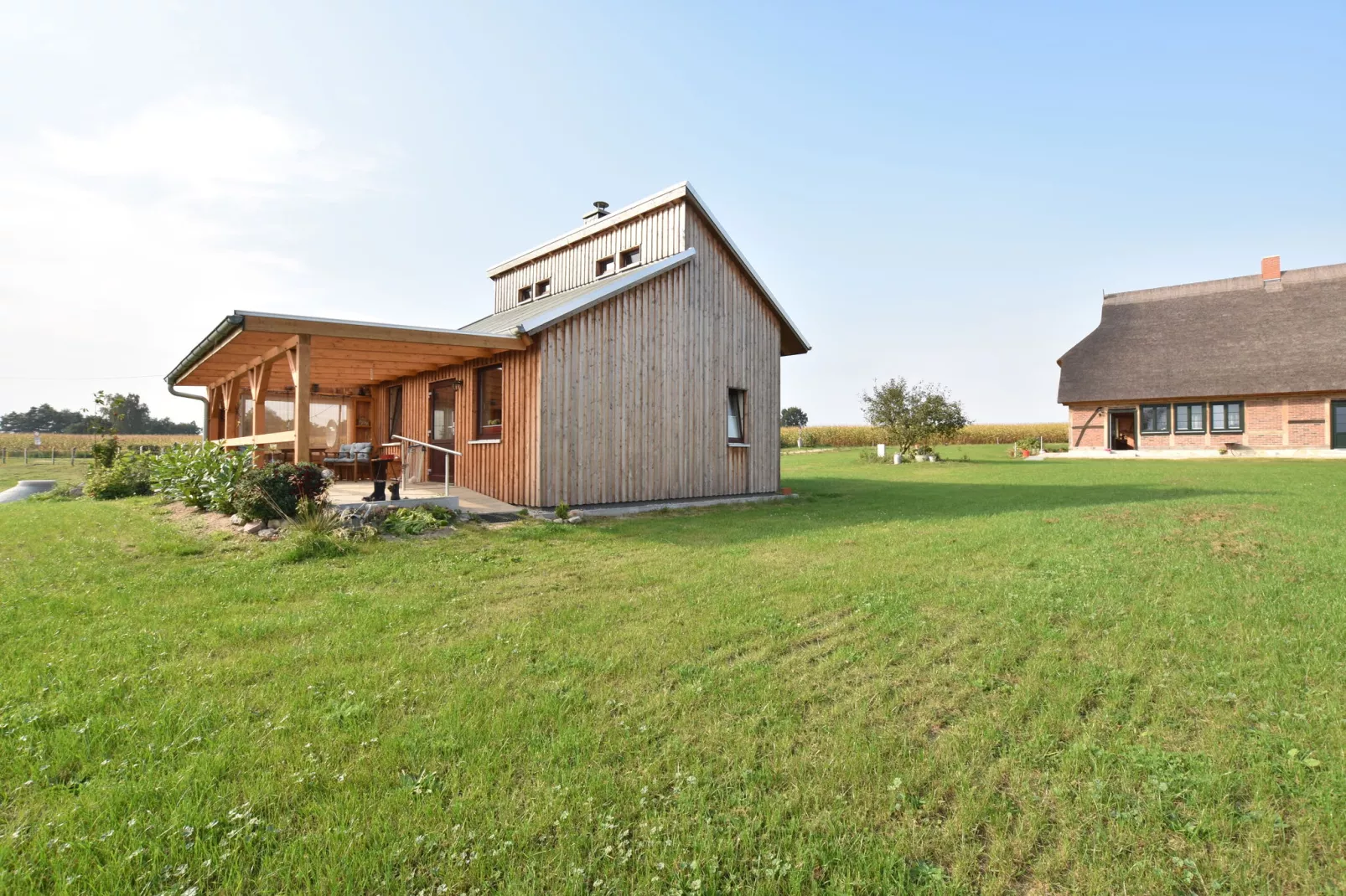 Ferienhaus Am See mit Kamin-Tuinen zomer